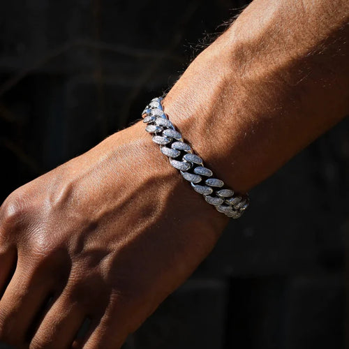 12mm white gold diamond Cuban link bracelet by MANDOTOS, featuring a luxurious, polished design with sparkling diamond accents.
