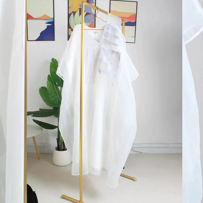 Elegant white African abaya for women with embroidery, plus size, suitable for parties or church events, by MANDOTOS INTERNATIONAL.