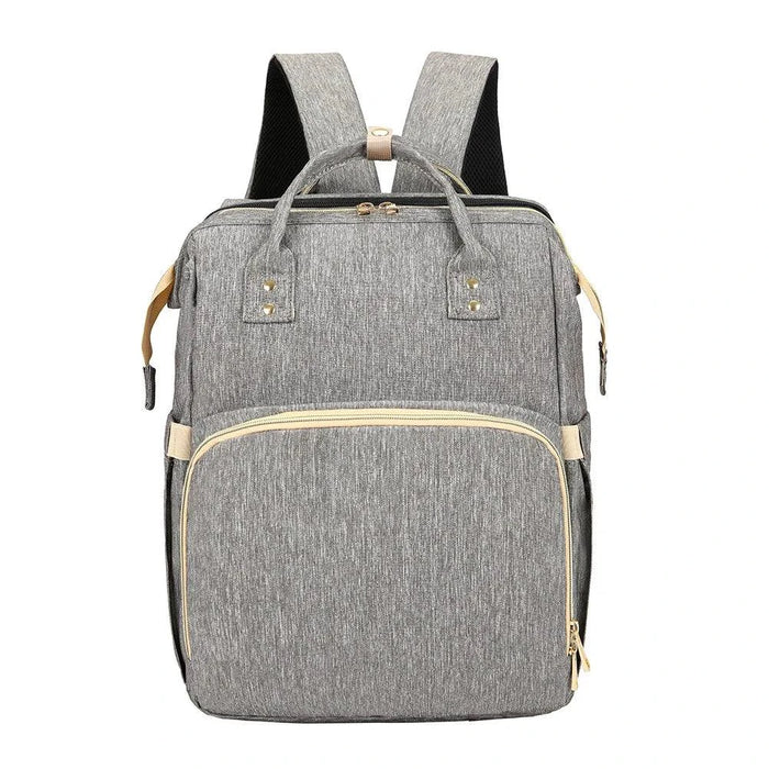 Mandotos all-in-one stroller diaper backpack with multiple compartments and adjustable straps, designed for parents on the go.
