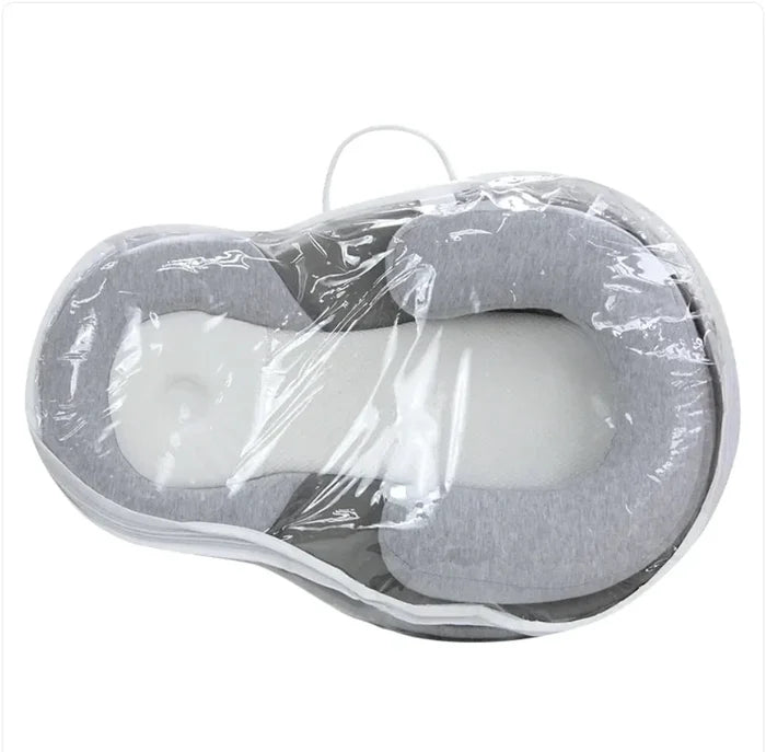Baby Anti-Spit Up Pillow by MANDOTOS, soft and supportive pillow designed to reduce spit-up for infants.