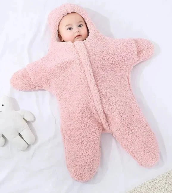 Soft baby quilt by MANDOTOS featuring plush fabric and colorful patterns perfect for nursery comfort and cuddling.