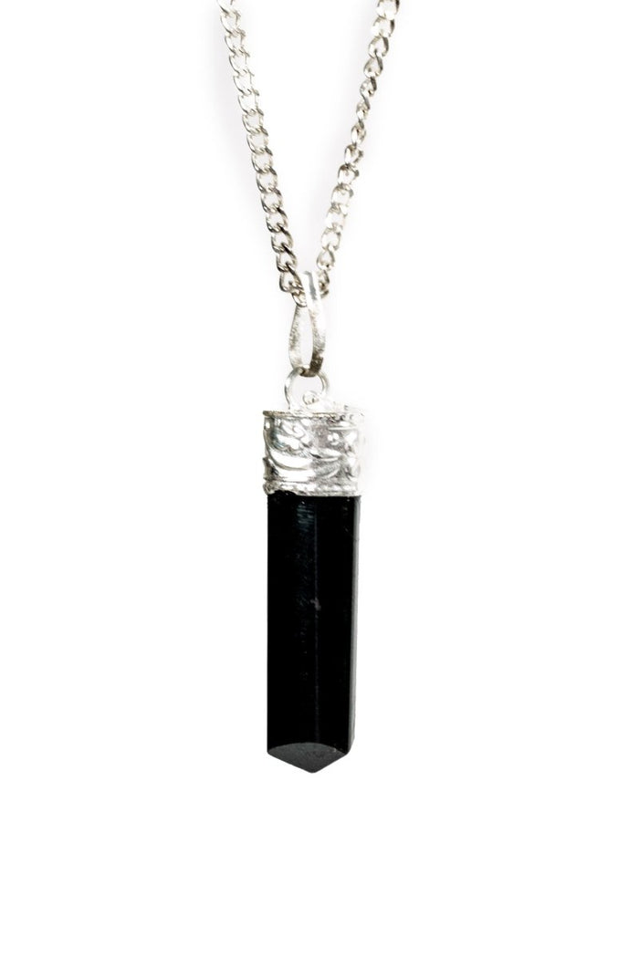 Silver-plated Black Tourmaline Protection Pendant from Ancient Energy, featuring a polished black stone on a sleek silver chain.