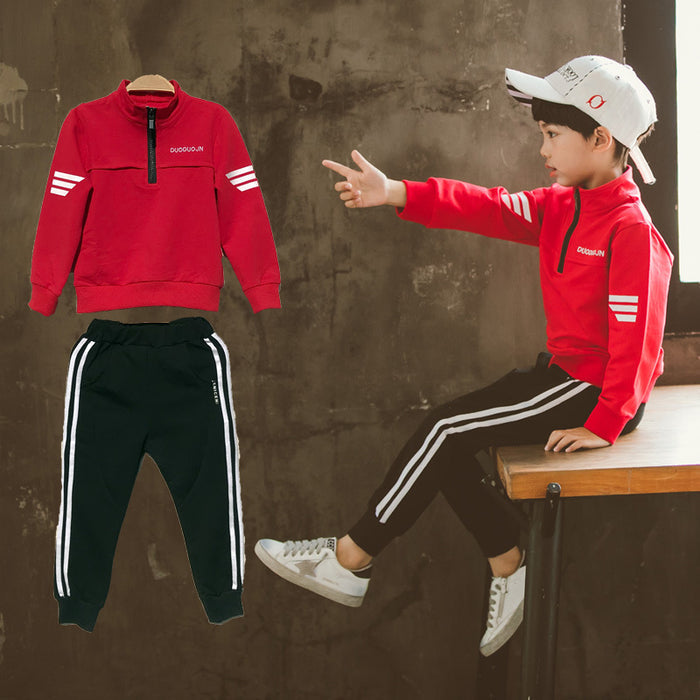 Young boy wearing Ancient Energy spring sports garment, casual leisure kids' school clothing in bright spring colors.