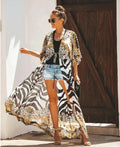 Mandotos Breeze Kimono Dress featuring flowing fabric, wide sleeves, and a relaxed fit perfect for casual summer wear.