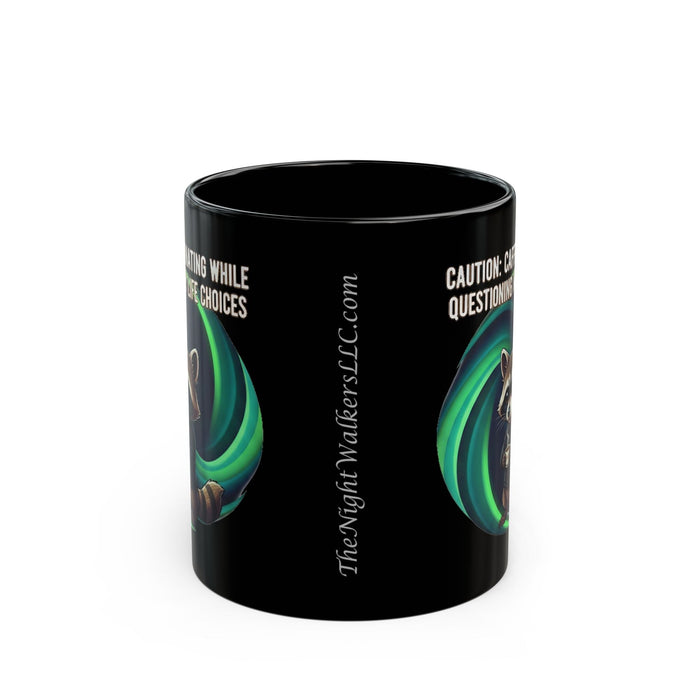 Black mug with green and white designs and text on a white background