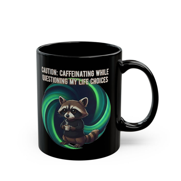 Black mug with a raccoon graphic and text on a white background