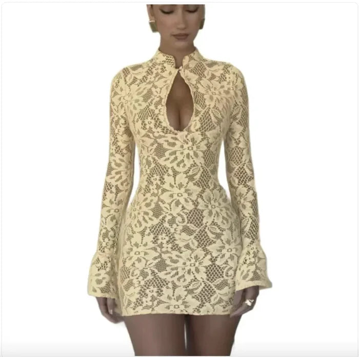 Mandotos chic hollow-out bell sleeve dress featuring stylish cutouts and flowing fabric, perfect for elegant occasions.