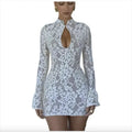 Mandotos chic hollow-out bell sleeve dress featuring stylish cutouts, long bell sleeves, and a modern elegant design.