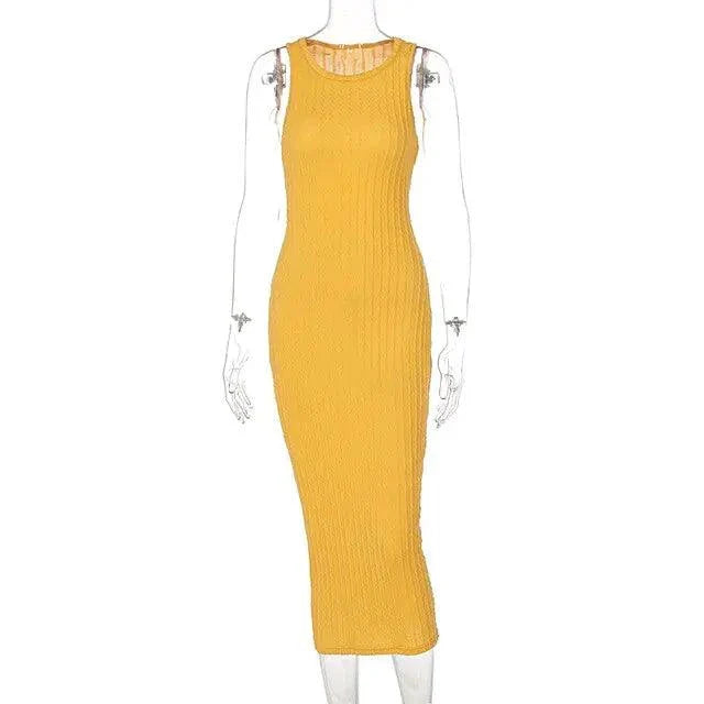 Mandotos chic knitted tank sweater dress featuring a stylish, fitted design in soft, cozy fabric.