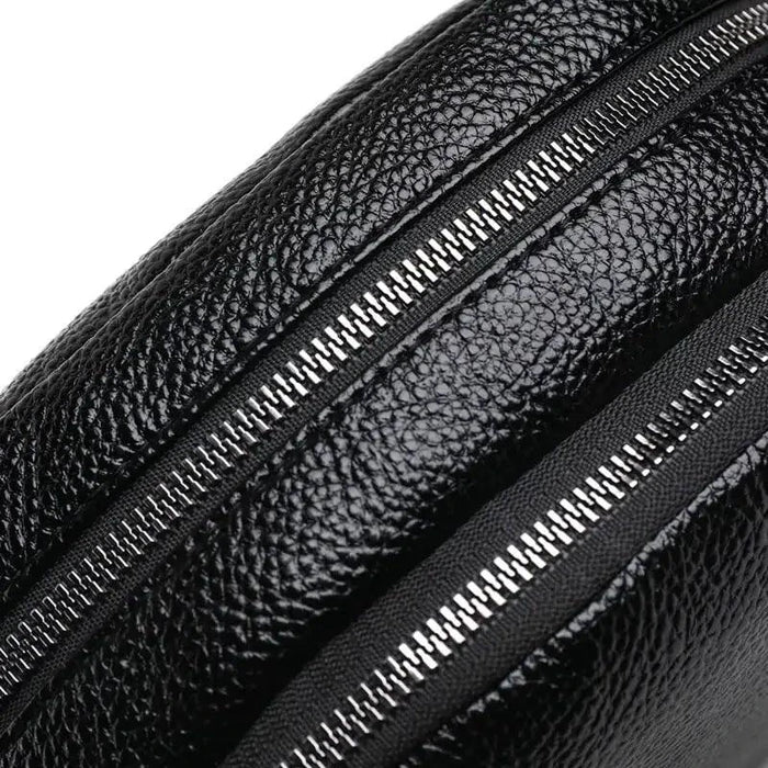Mandotos chic leather circle purse with a sleek design and adjustable strap, perfect for stylish everyday carry.