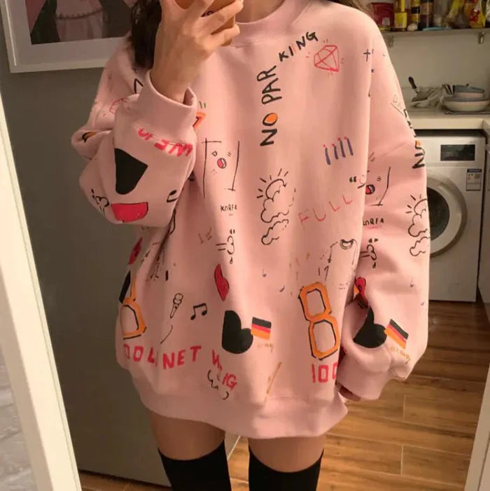 Chic loose women's thick long sleeve sweatshirt dress by MANDOTOS INTERNATIONAL, soft fabric with a relaxed fit and stylish design.