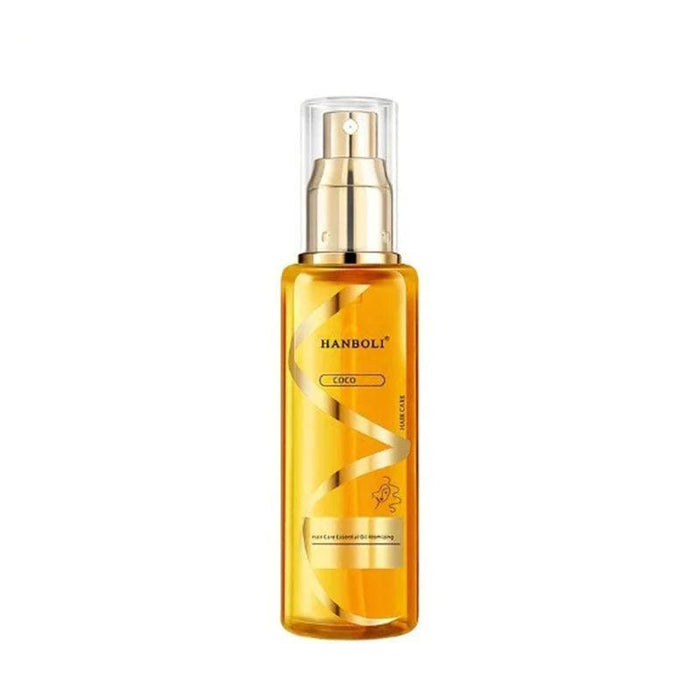 Bottle of Perfume Soft Hair Care Oil with spray nozzle, designed to nourish, reduce static, and hydrate frizzy hair.