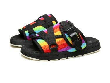 Chic unisex beach slides by MANDOTOS INTERNATIONAL featuring stylish design and comfortable slip-on footwear for warm weather.