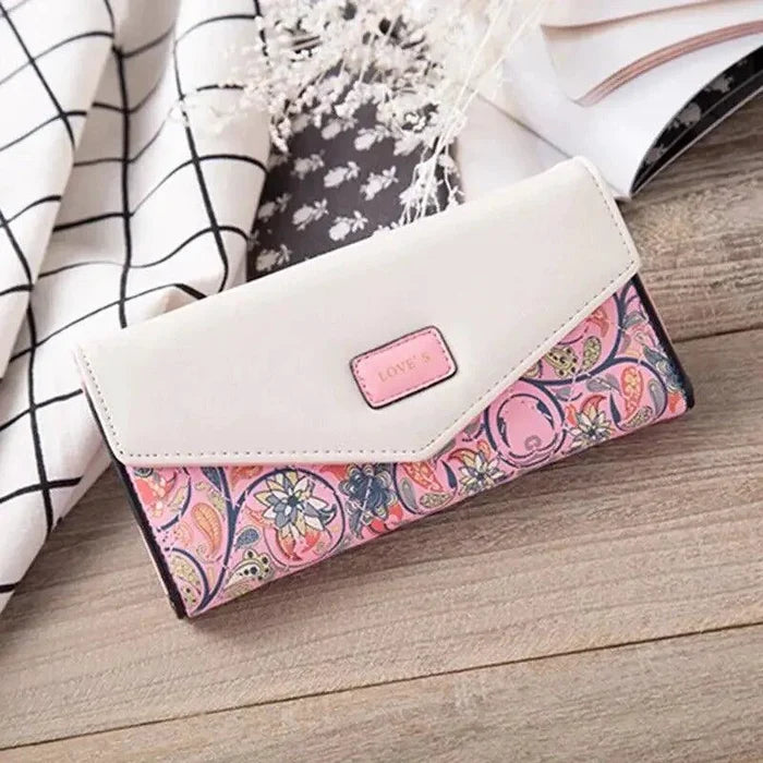 Mandotos women's leather clutch wallet and card holder with sleek design and multiple card slots.