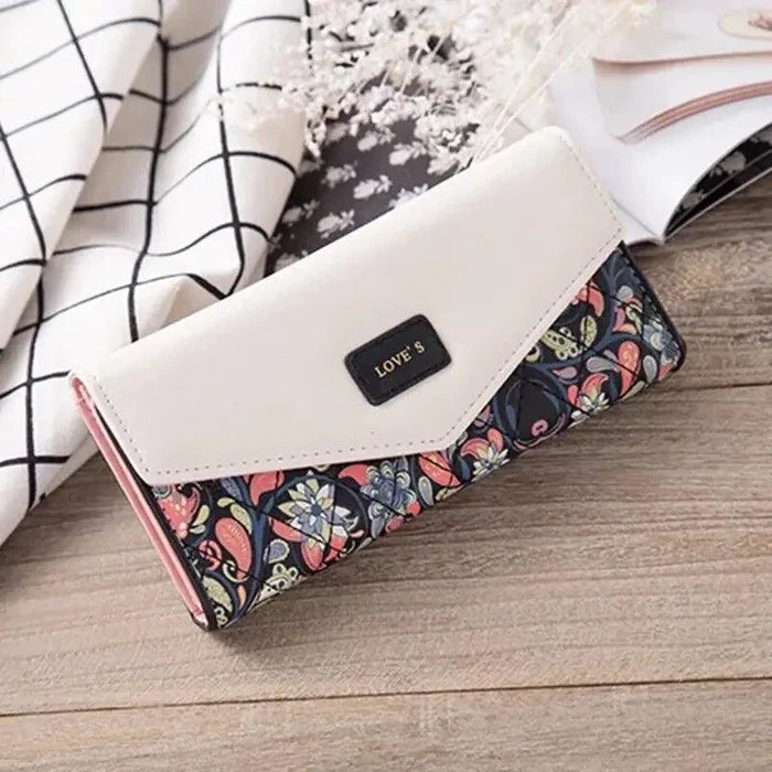 Mandotos women's leather clutch wallet and card holder with sleek design and multiple card slots for organization.