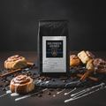 Gun Powder Grinds Cinnabun with cinnamon rolls and icing