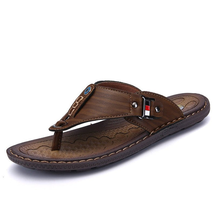 Mandotos International Coastal Trek non-slip sandals with textured soles and adjustable straps for secure comfort.