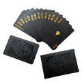 Black and gold waterproof playing card set from Dmagic, featuring poker suits for card games and magic tricks.