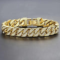 Gold Cuban curb bracelet by MANDOTOS featuring interlinked flat, rounded links for a stylish, bold jewelry accessory.