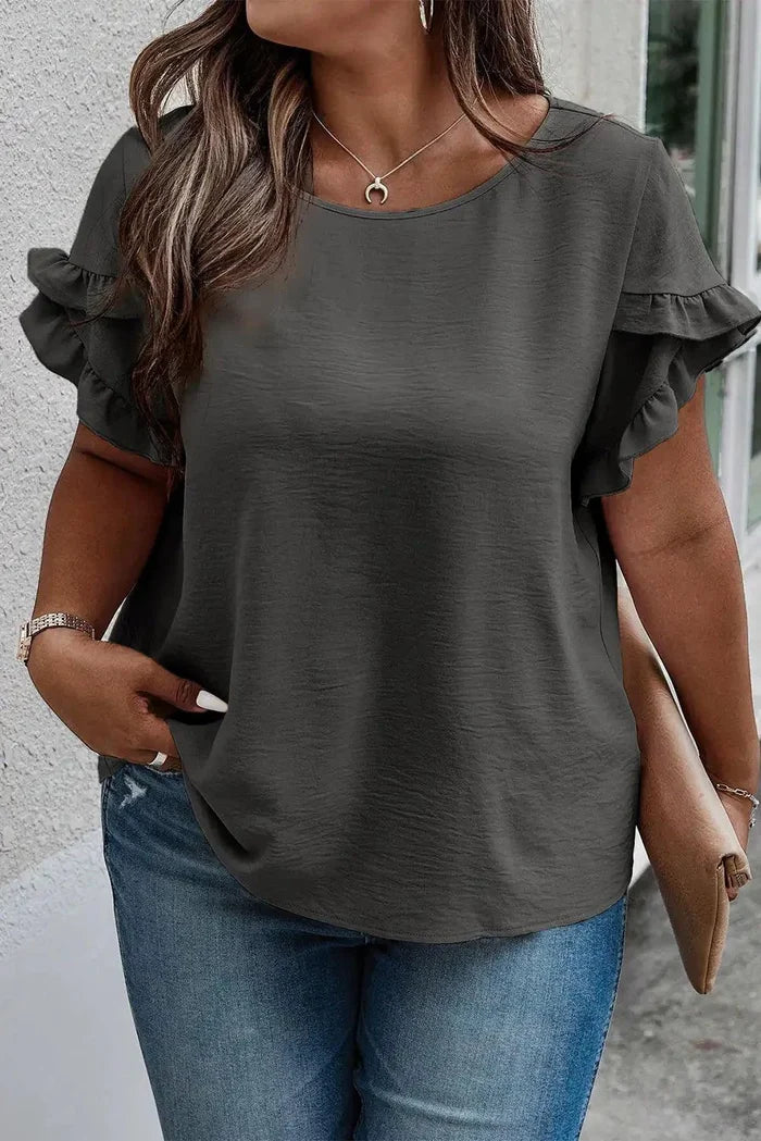Mandotos Curvy Samantha Blouse in vibrant fabric, featuring a stylish fit and elegant design for curvy women.