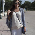 Mandotos Denim Blossom Poncho featuring a floral pattern and casual fit, displayed on a neutral background.