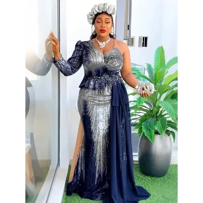 Elegant African V-neck maxi dress for wedding party by MANDOTOS INTERNATIONAL, featuring vibrant fabric and stylish design.
