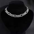 Elegant cubic zirconia Cuban necklace by MANDOTOS featuring sparkling stones and a bold chain design.