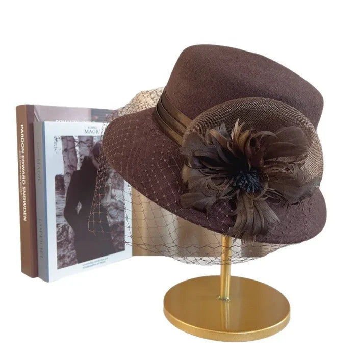 Elegant floral top hat for women by MANDOTOS INTERNATIONAL, perfect for autumn winter fashion, weddings, and parties.