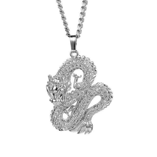 Elegant gold zircon dragon pendant with intricate design, featuring sparkling stones, by MANDOTOS.