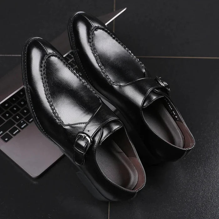 Elegant leather Oxfords by MANDOTOS featuring classic design and polished finish, perfect for formal and stylish occasions.