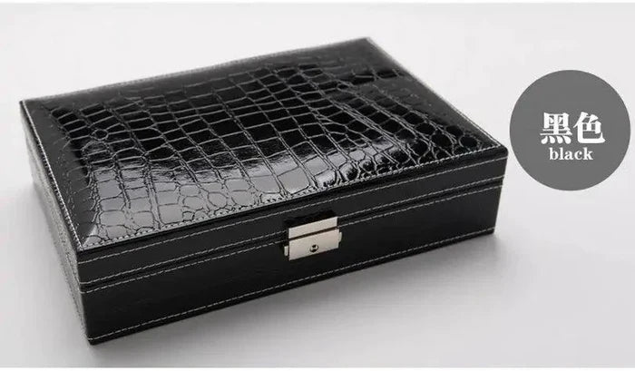 Elegant leather vanity case by MANDOTOS featuring a sleek design with a handle and secure clasp, perfect for travel and beauty essentials.