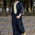 Elegant men's black linen robe by MANDOTOS INTERNATIONAL, featuring a comfortable fit and stylish design.