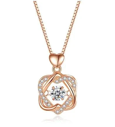 Elegant rose gold heart necklace by MANDOTOS featuring a delicate chain and a polished heart pendant.