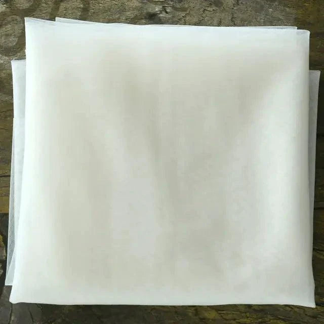 Long flowing wedding veil from ElegantBride V14 by MANDOTOS, sheer lightweight fabric with delicate lace trim.
