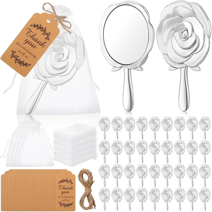 Mandotos International Eleganza Rose handheld mirror set with decorative handles, ideal for special occasions.