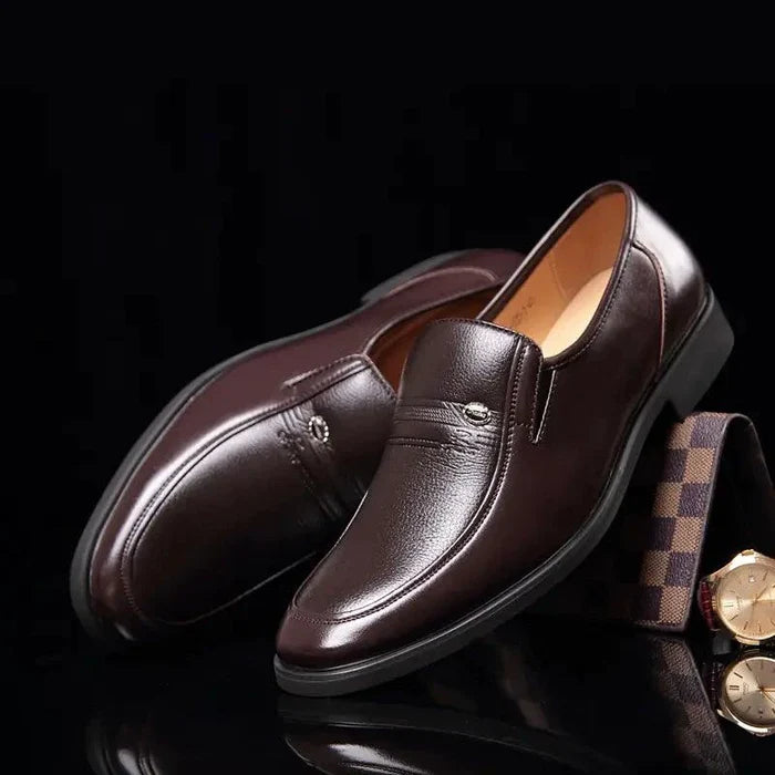 Mandotos Elite Leather Dress Shoes showcasing sleek black leather design with polished finish and classic lace-up style.