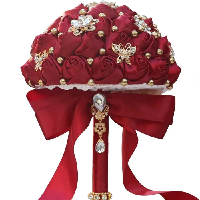 Dark red eternal rose bridal bouquet by MANDOTOS INTERNATIONAL with lush, long-lasting roses for weddings and special occasions.