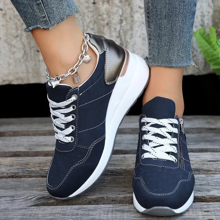 Mandotos International stylish lace-up sneakers with zipper detail and medium heel height, perfect for casual and trendy outfits.