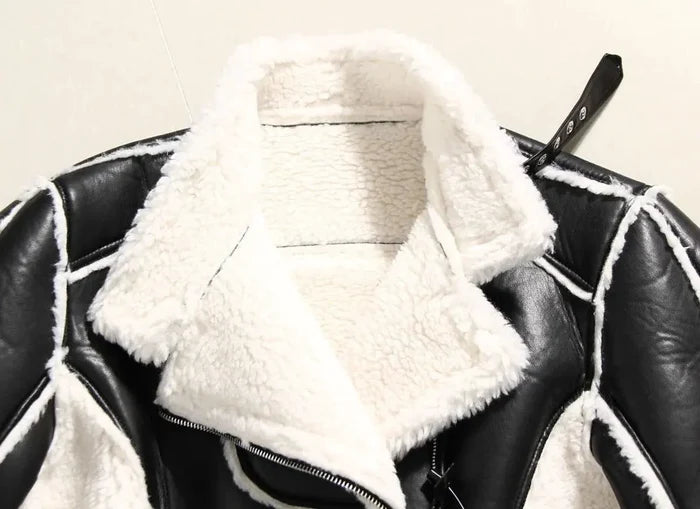Mandotos faux leather cropped jacket featuring a classic collar, zip front, and fitted style for a trendy look.