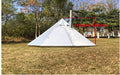 Mandotos Featherlight Pyramid Camp Shelter set up outdoors, showcasing lightweight, durable camping shelter with open sides and rainfly.