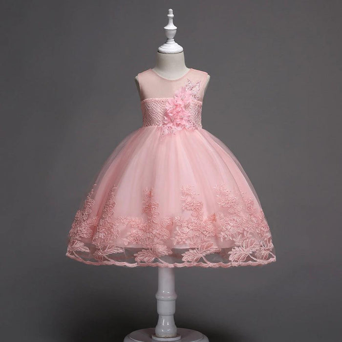 First Communion flower girl dress by Mandotos featuring lace trim, tulle fabric, and intricate bead embroidery.