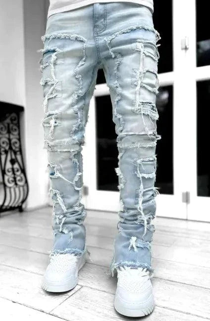 Mandotos FlexiStyle denim jeans featuring classic five-pocket design, slim fit, and medium wash fabric.