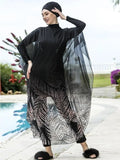 Floral burkini swimsuit for women by Mandotos International, modest swimwear perfect for middle-aged women at the beach or pool.