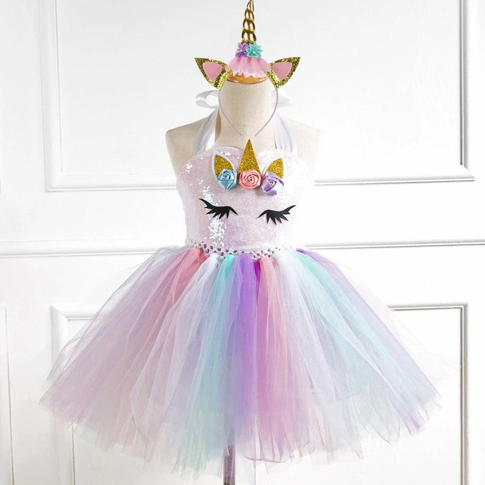 Girls' dress from Ancient Energy featuring a colorful floral pattern and lightweight fabric, perfect for spring or summer wear.