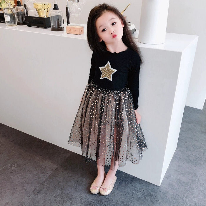 Girls' dress in size 0 by Ancient Energy, featuring a colorful floral pattern and soft fabric suitable for young children.