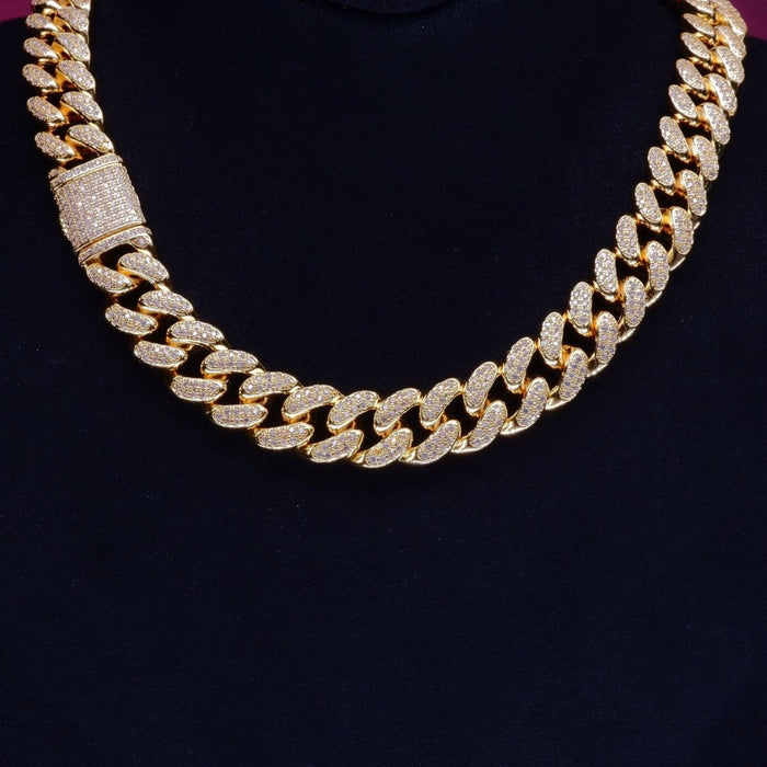 Gold Shine Iced Cuban Chain by MANDOTOS featuring a luxurious iced design and bold Cuban link style.
