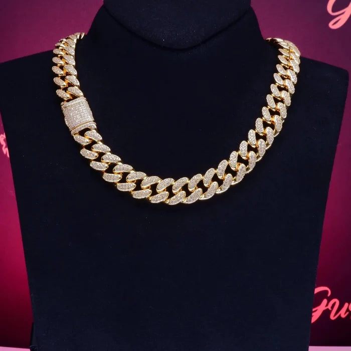 Mandotos Gold Shine Iced Cuban Chain featuring a luxe style upgrade with sparkling iced detailing and a bold, chunky design.