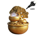 Mandotos Golden Prosperity Tree Fountain with flowing water and intricate gold-colored design, symbolizing prosperity and good fortune.