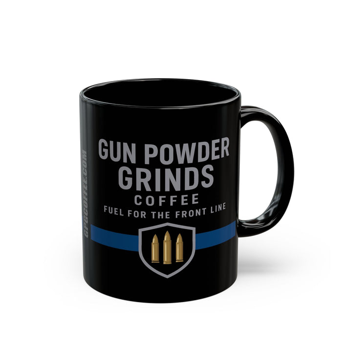 Black mug with 'Gun Powder Grinds Coffee' text and logo on a white background