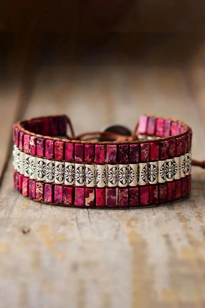 Handmade triple-layer natural stone bracelet by MANDOTOS featuring smooth, rounded stones in earthy tones.